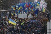 Ukraine protests: Thousands march through capital